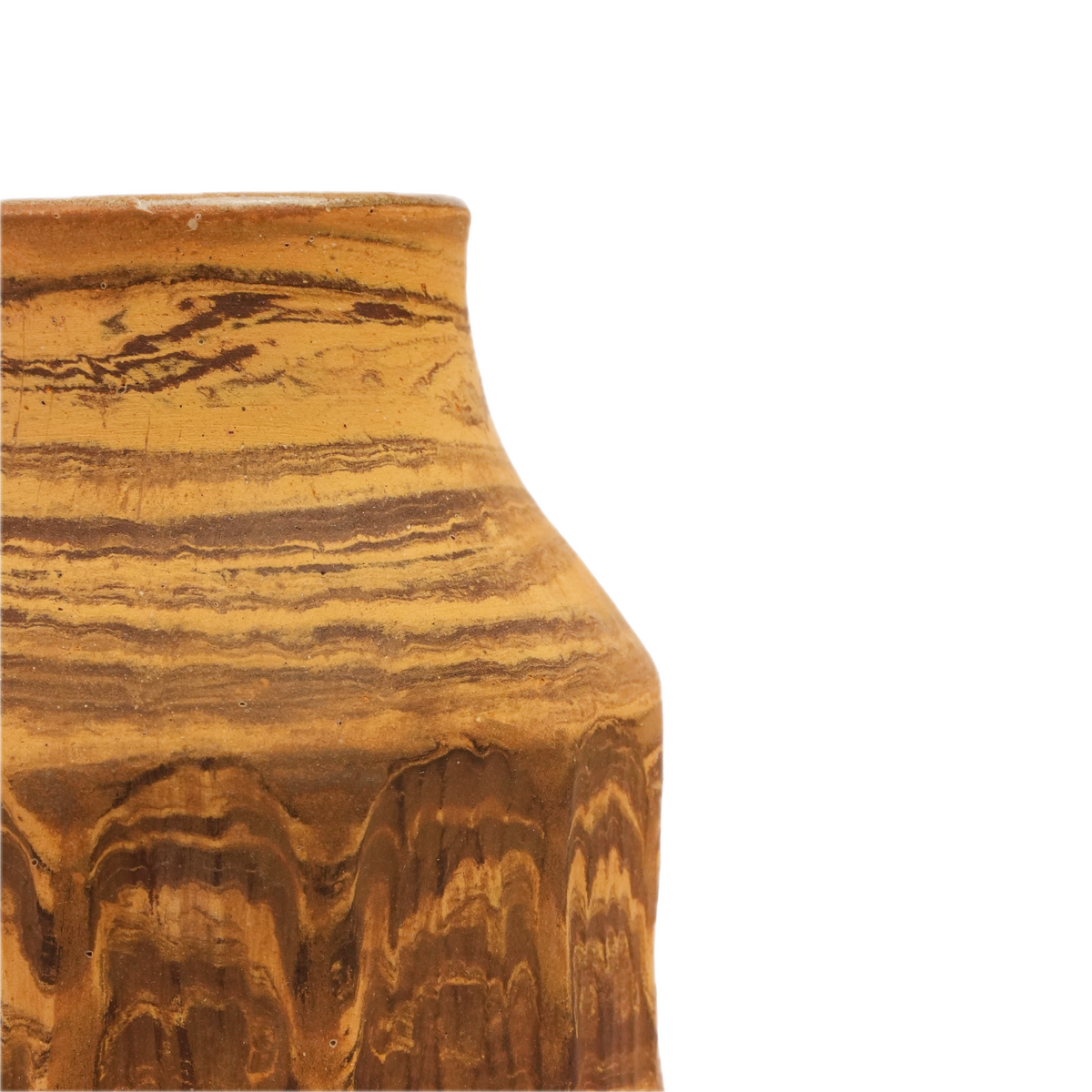 Close-up of hand-carved marbling on Tiramisu ceramic vase showing yellow and brown clay pattern