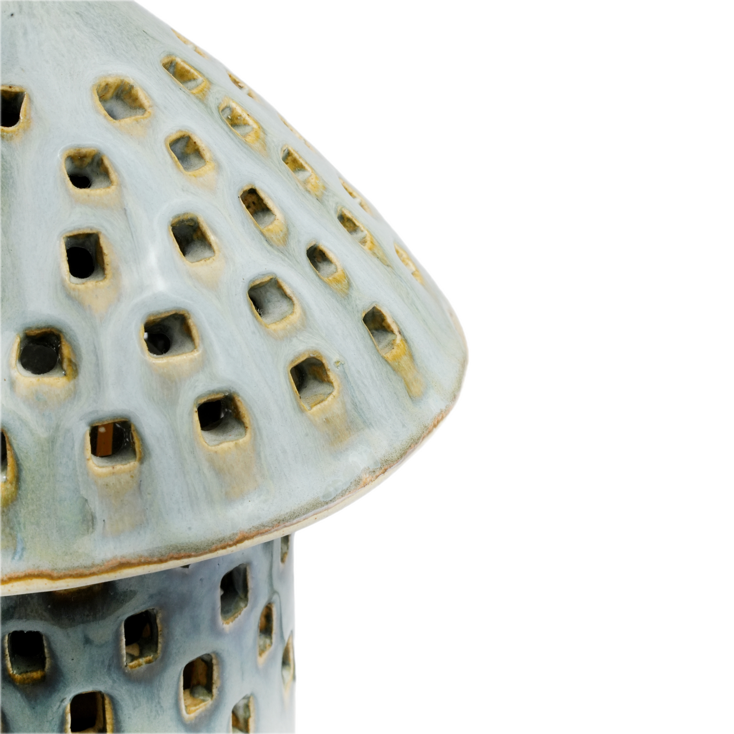 Close-up of hand-pierced holes on Mushroom Lamp ceramic cap, Mocha Cat Pottery