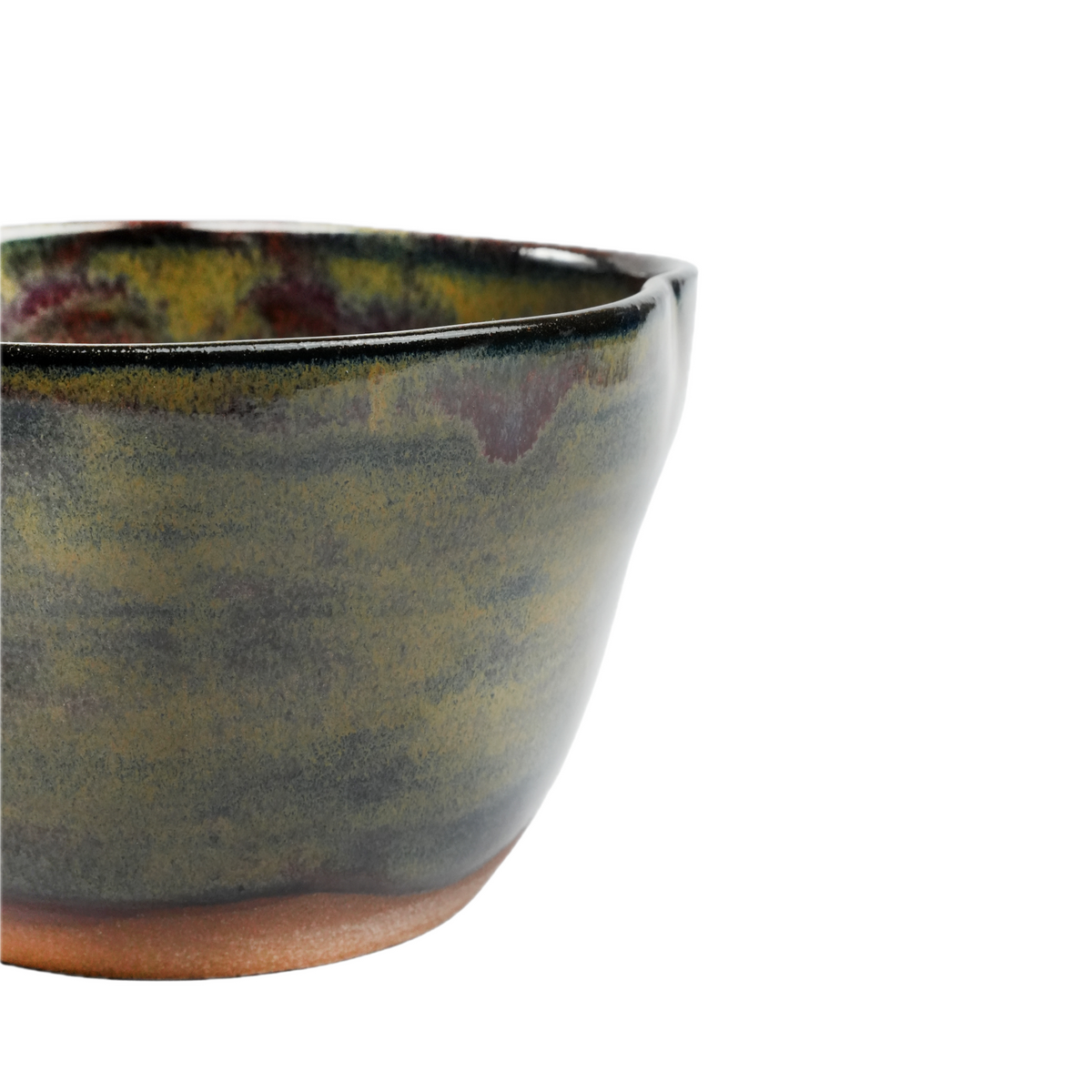 Close-up of iridescent glaze texture on handmade stoneware bowl