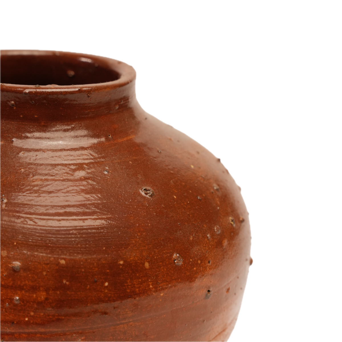 Close-up of chocolate-brown glaze over textured stoneware, Choco Ball vase by Mocha Cat Pottery