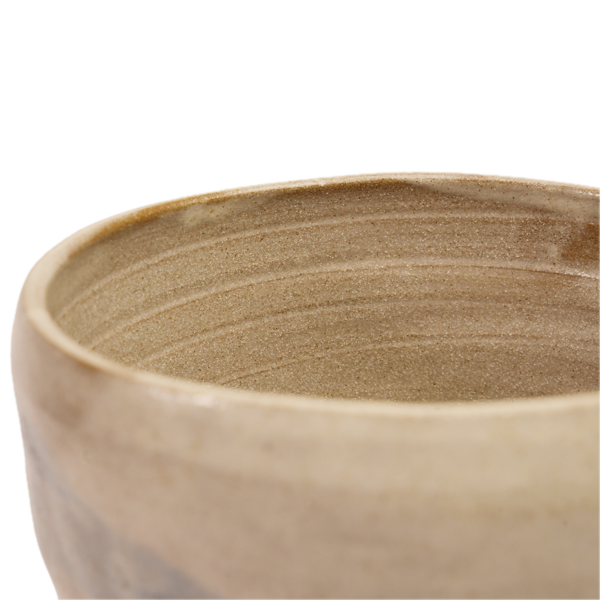 Close-up of raw clay peeking through brushed glaze on Flow vase, Mocha Cat Pottery