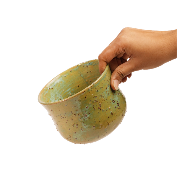 Poison Ivy textured ceramic vase held in hand for scale, Mocha Cat Pottery Bangalore
